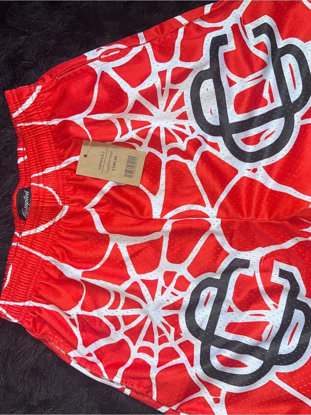 Men's Red Athletic Shorts with White Web Graphic